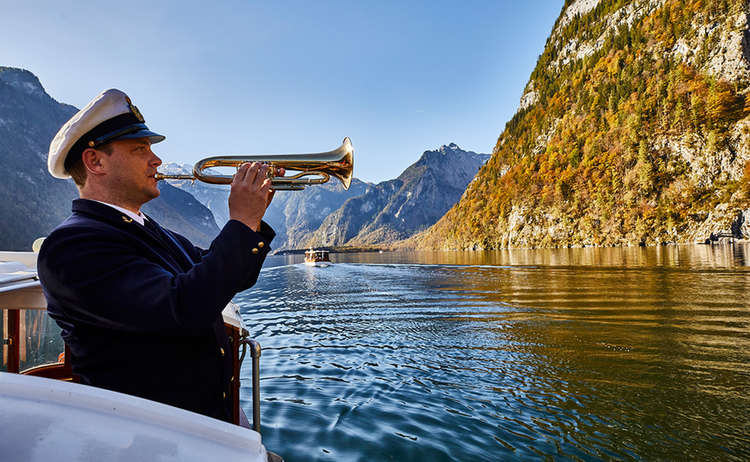 the boatman plays his trumpet